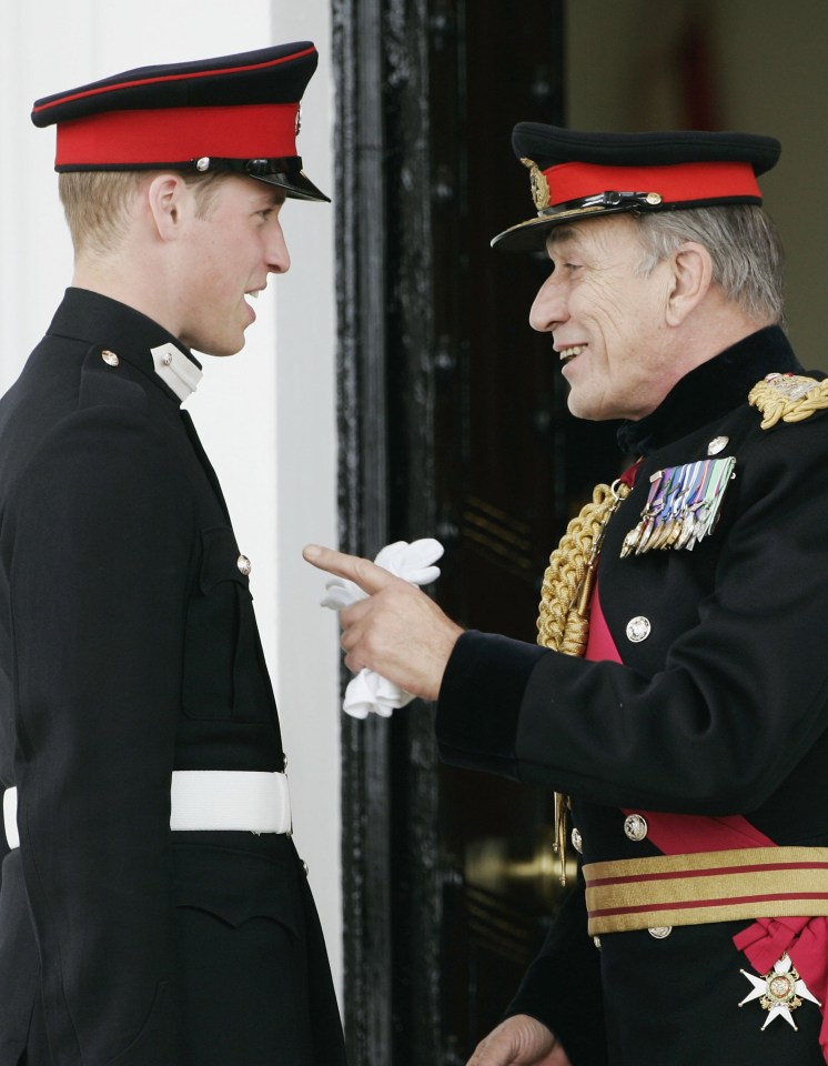 two men in military uniforms are talking to each other