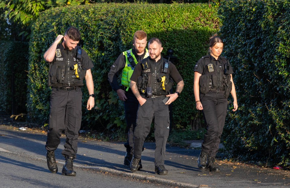 Officers have been scouring the area behind Salford Royal Hospital site this evening