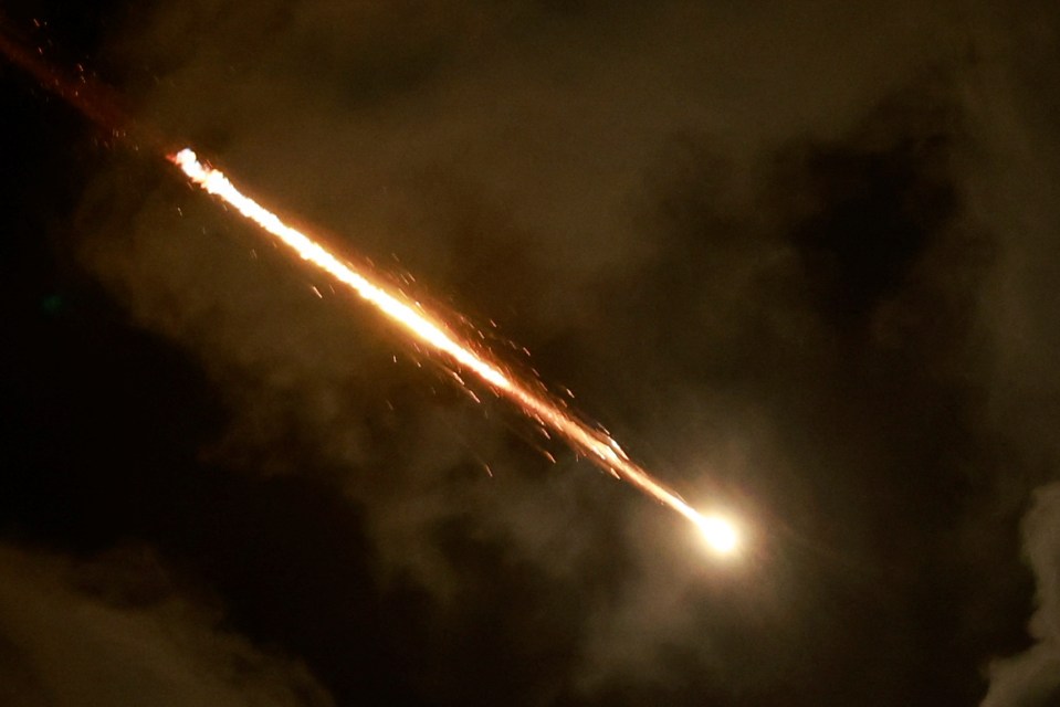 Bright orange streaks of fire could be seen above Israel's cities