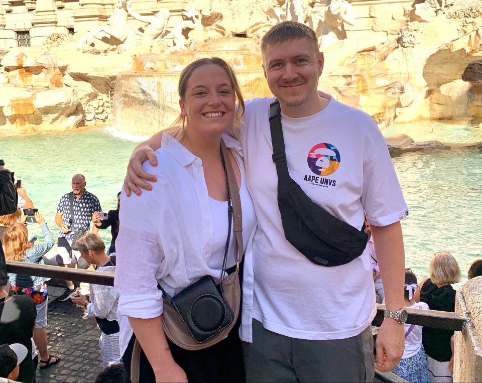 Sophie and Ash after he proposed at the Trevor Fountain in Rome, Italy