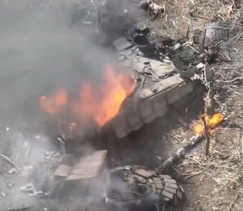 The site of a smoking Russian tank following a Ukrainian strike