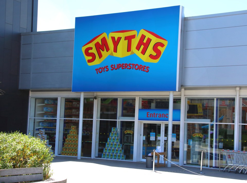 the entrance to a smith 's toys superstores store