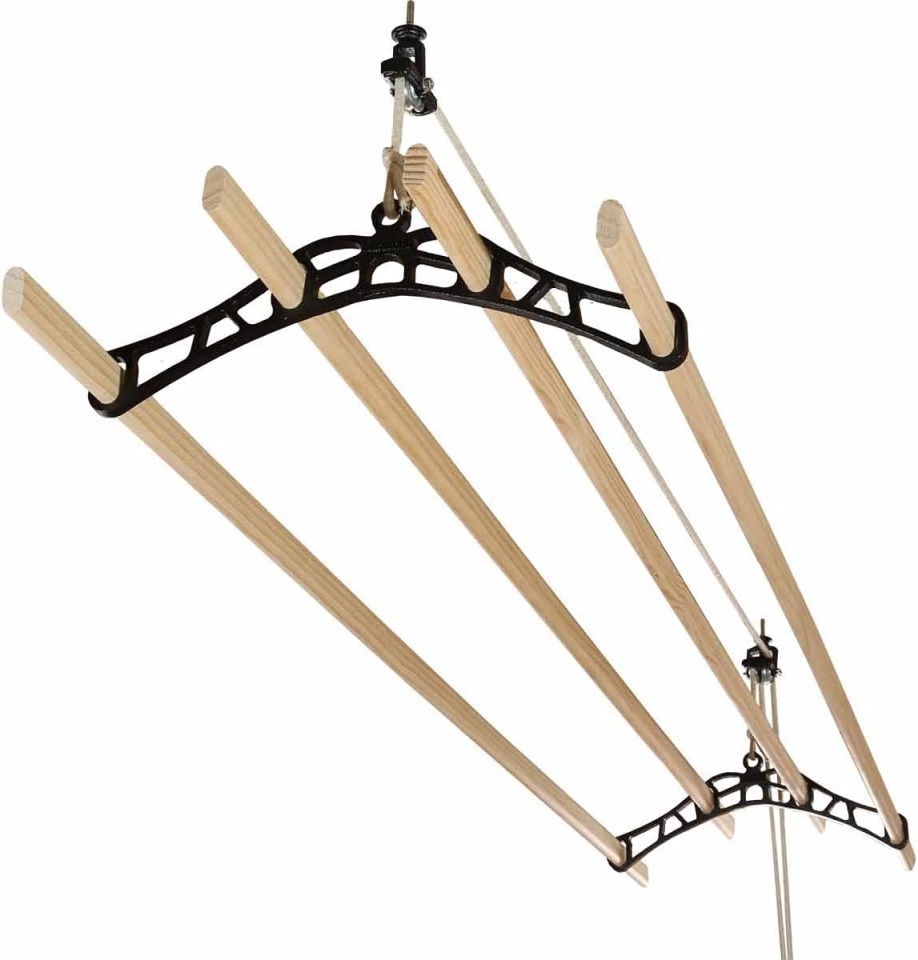 a wooden clothes line with a black hanger attached to it