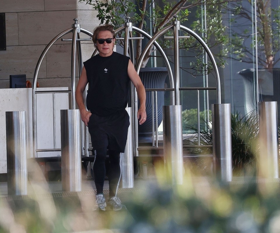 He donned all-back sports gear and white trainers as he enjoyed some downtime ahead of a gig in Perth