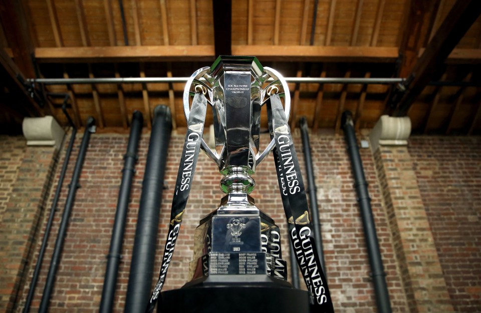 a guinness trophy is hanging from the ceiling