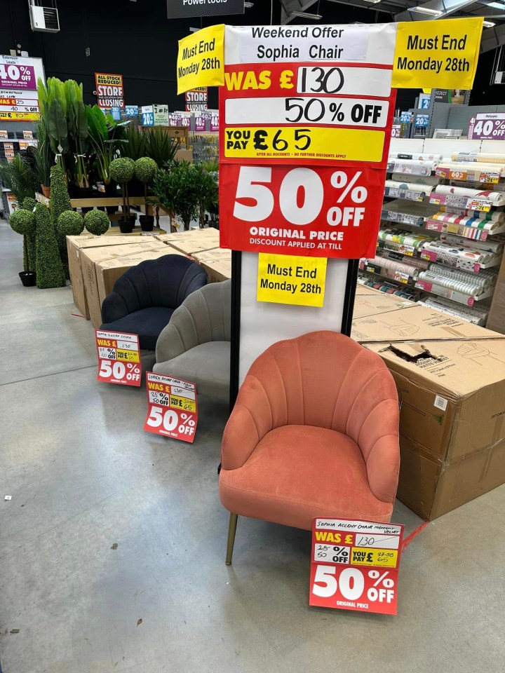 a sign in a store that says 50 % off