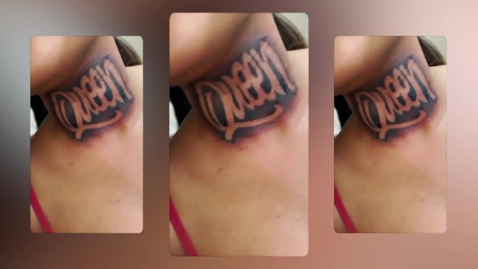 a woman has the word queen tattooed on her neck