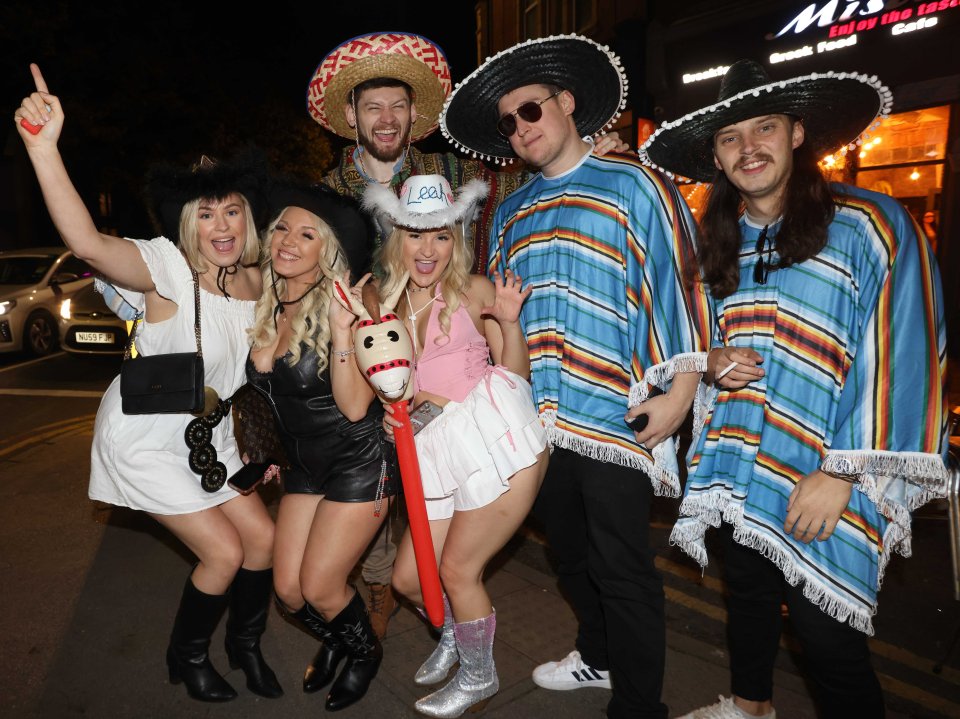 Some friends went as cowgirls wearing hats, boots and carrying a blow-up horse