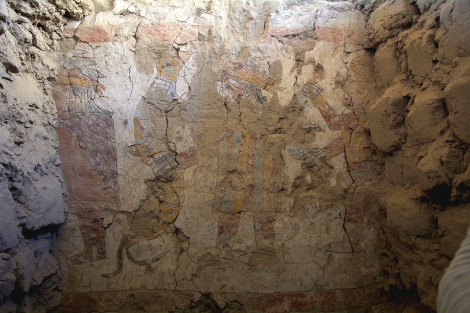 In a second room, murals show warriors, anthropomorphised weapons and a monster chasing a man.