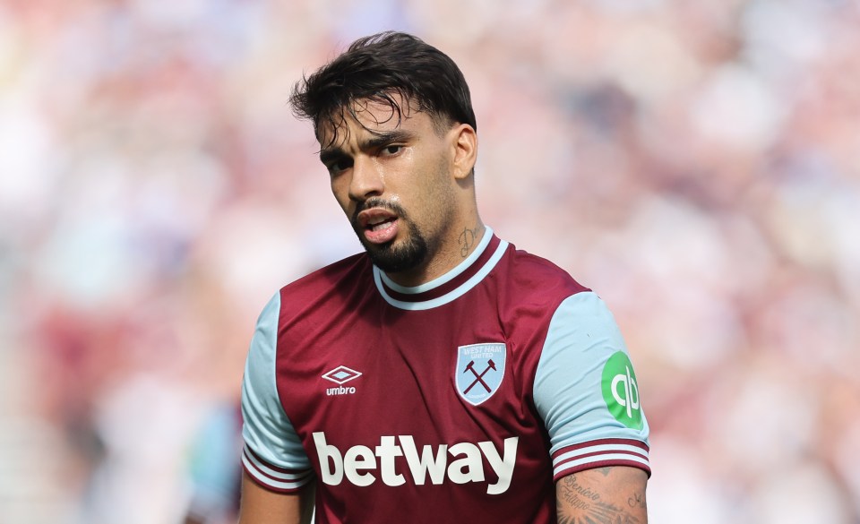 a man wearing a purple and blue jersey with the word betway on it