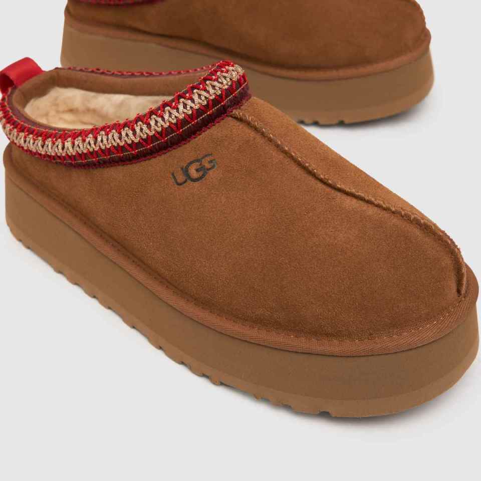 The B&M slippers look like a dupe for Ugg's Tazz platform slippers (pictured)