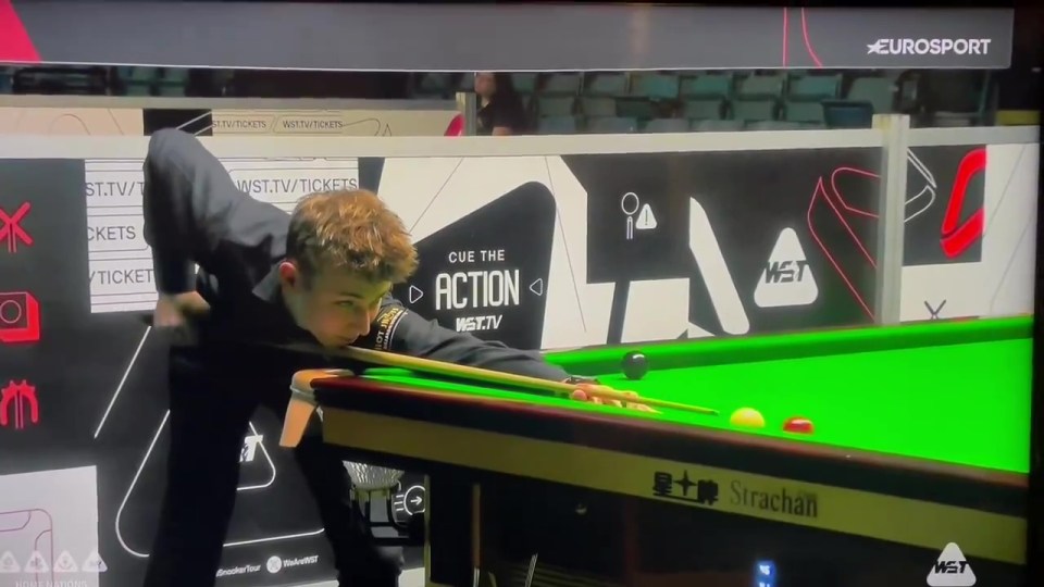 Antoni Kowalski missed a regulation red against Joe Perry - and took his frustration out on his cue