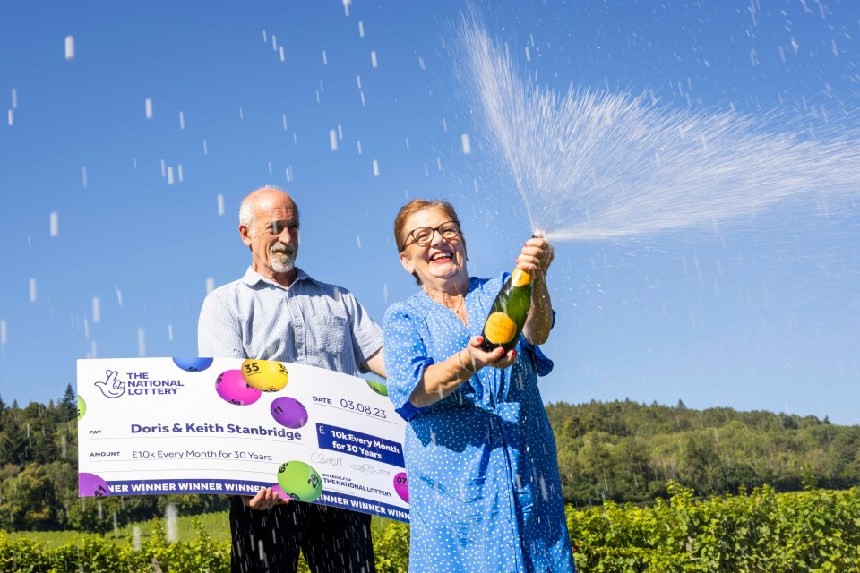 doris and keith stanbridge celebrate winning the national lottery