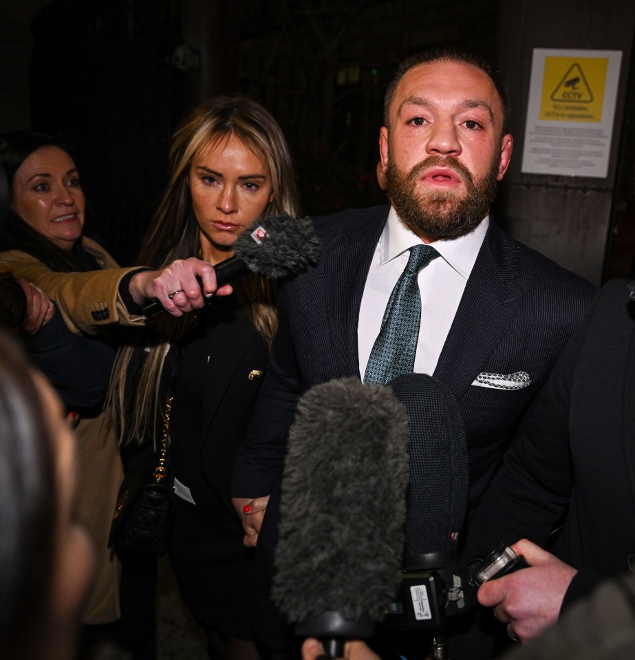 Conor McGregor and partner Dee Devlin leaving the High Court in Dublin