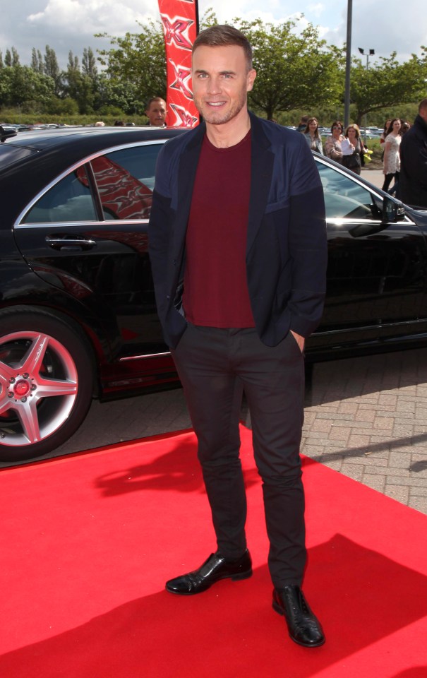 MANCHESTER, UNITED KINGDOM - JUNE 06: Gary Barlow arrives for the X Factor auditions on June 6, 2012 in Manchester, England. (Photo by Nathan Cox/Getty Images)