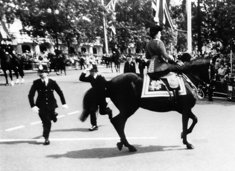 Police sprung into action as the Queen remained calm after the shots were fired