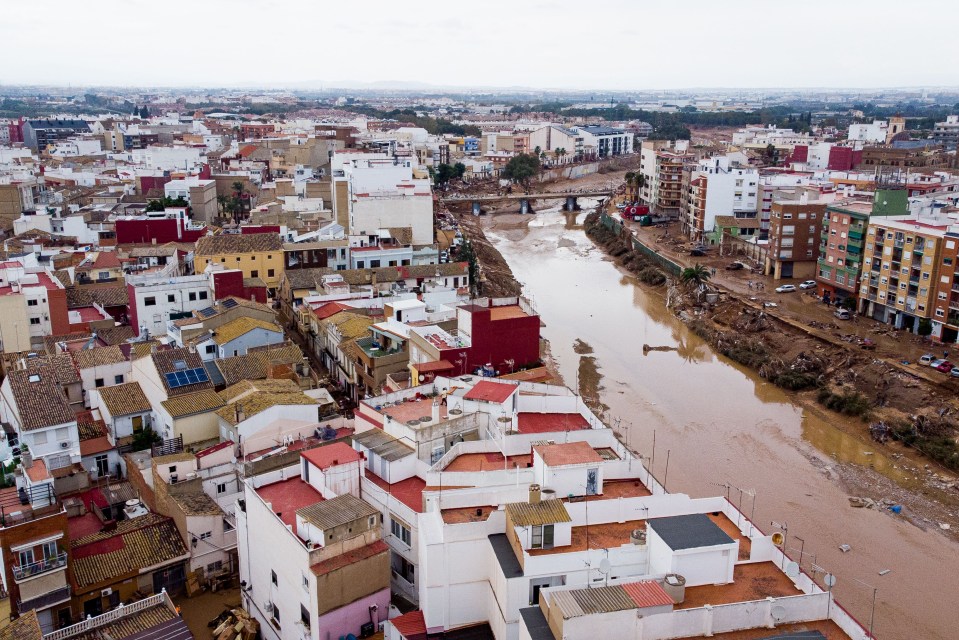 an aerial view of a city with a river running through it