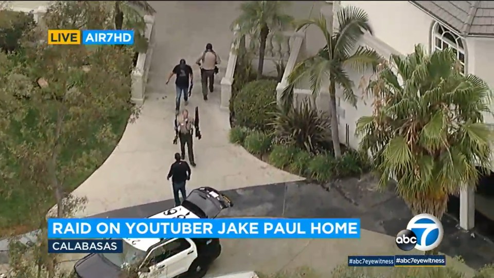 an aerial view of a raid on youtuber jake paul home