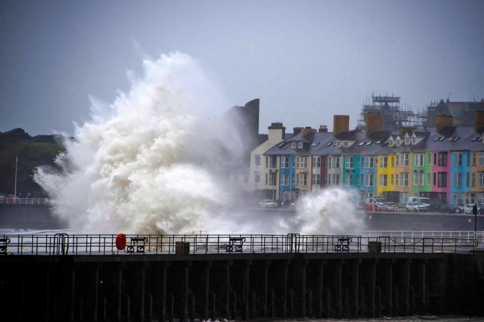 Gale force winds and huge waves batter the seaside town of Aberystwyth in Ceredigion, Wales