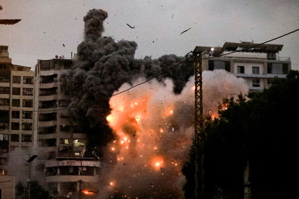 A fireball erupts from the site of an Israeli airstrike that targeted the area of Tayouneh in Beirut’s southern suburbs on Sunday