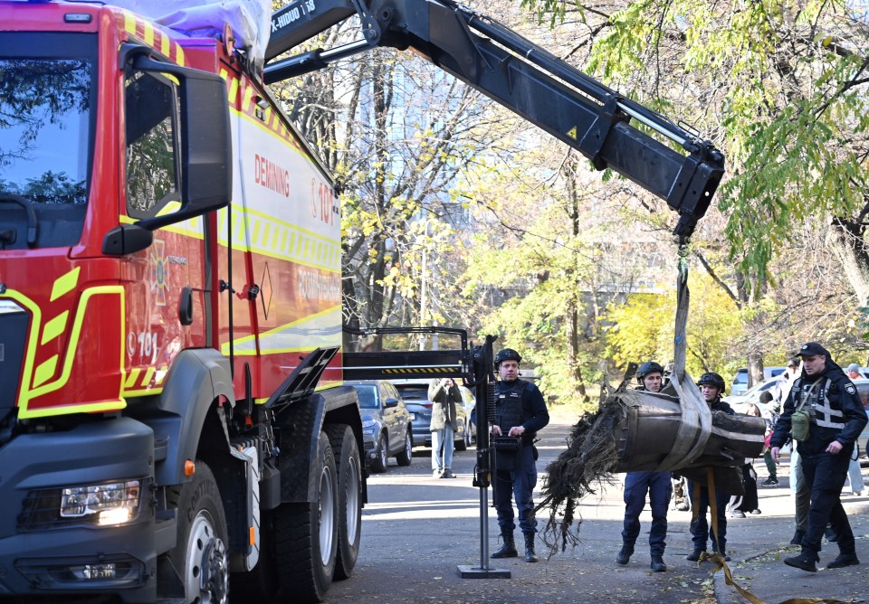 Cops and rescuers transporting a fragment of a downed Russian hypersonic missile Zircon