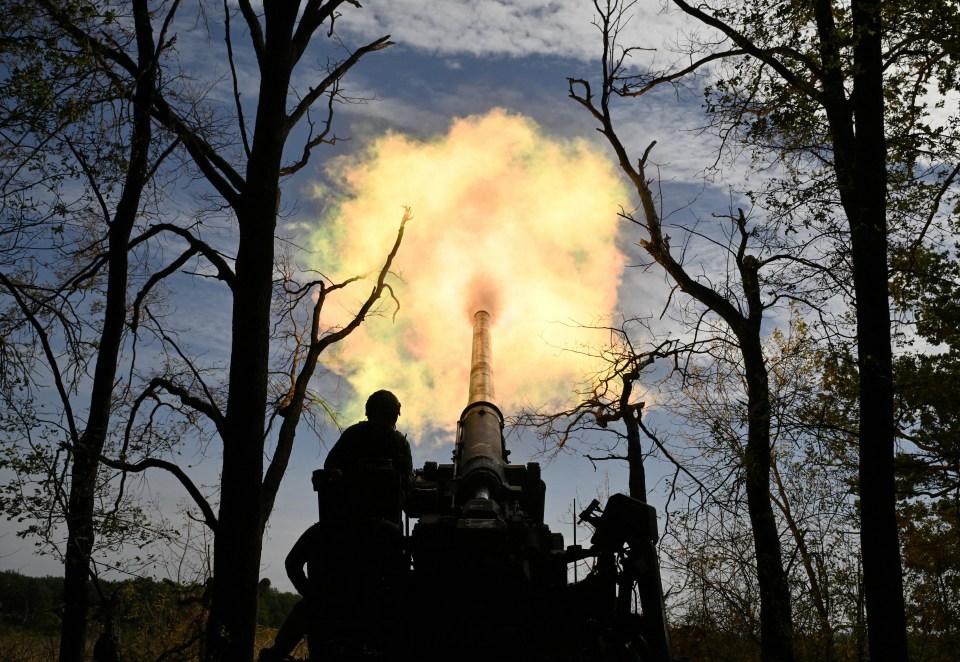 Ukrainian troops fire a 2S7 Pion self-propelled cannon towards Russian positions in the Donetsk region