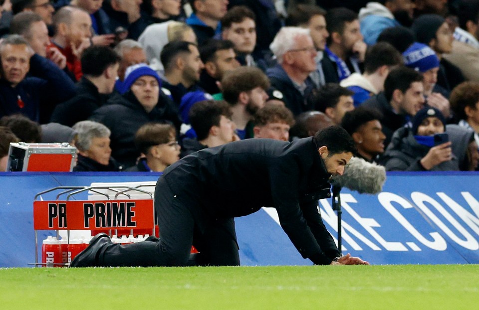 a man on his knees in front of a sign that says prime