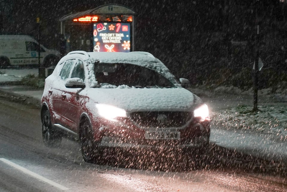 Commuters in Sheffield navigating snow on the roads on Saturday