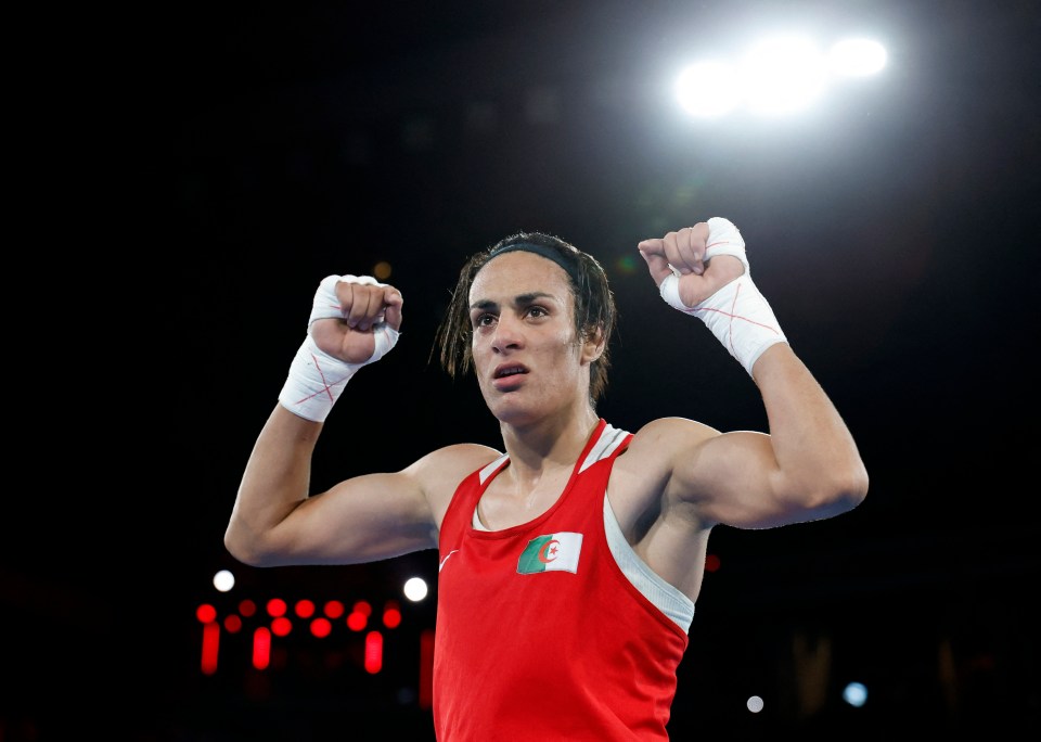 a woman in a red tank top with the flag of algeria on it