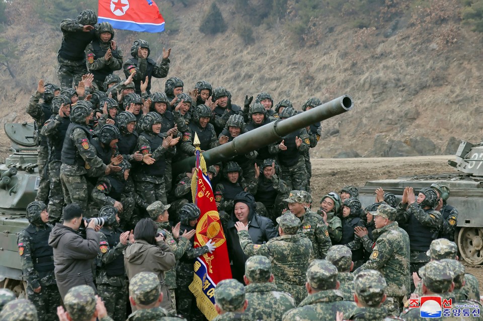 Kim Jong-un, centre, with his troops in North Korea