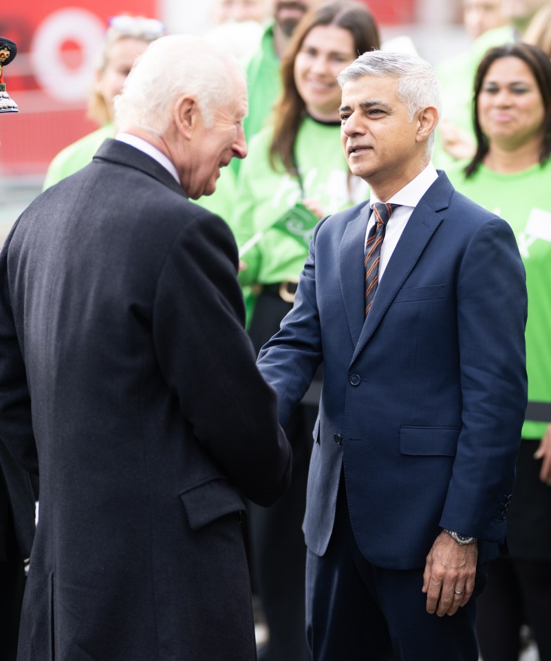 The monarch is pictured here meeting Mayor of London Sadiq Khan