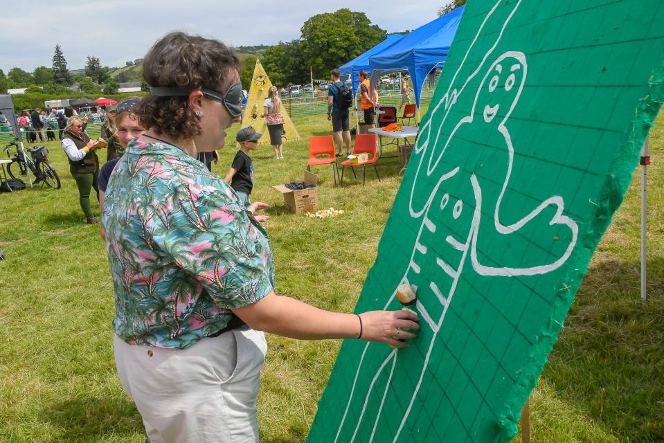 Those competing can also take part in the knob and spoon race, pin the knob (pictured) and knob darts