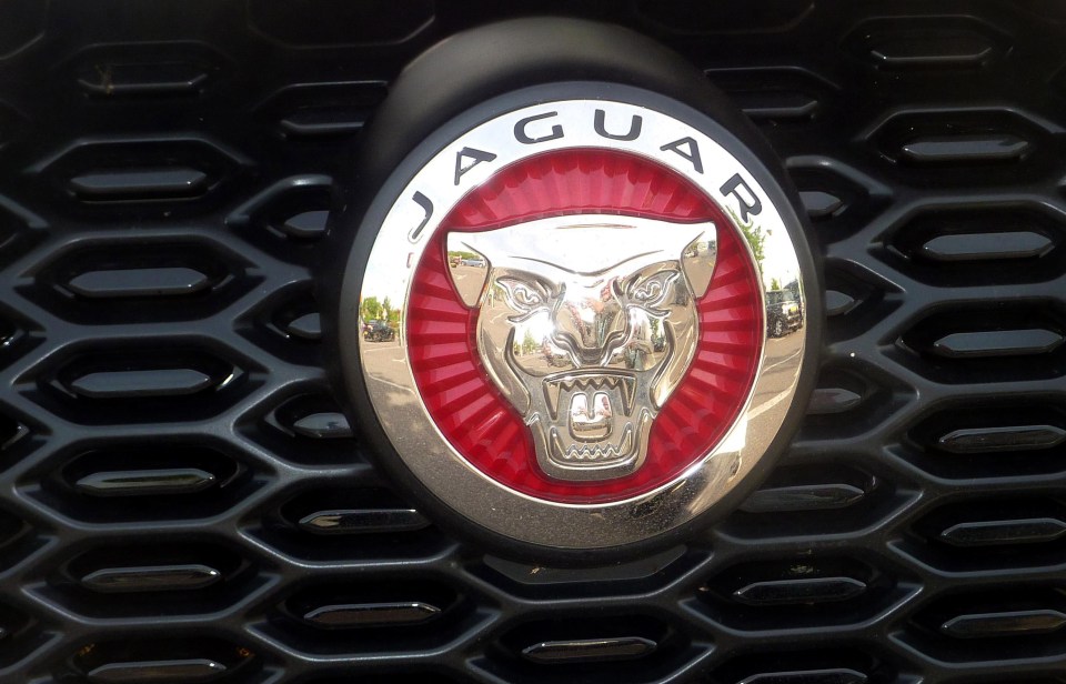 The classic logo showing a growling Jaguar