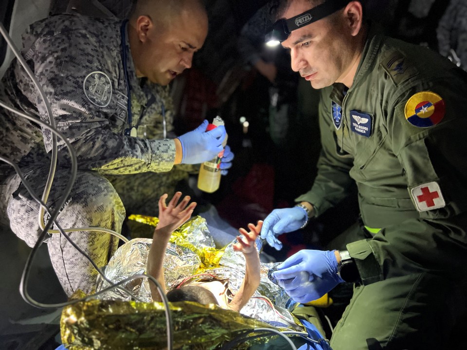 One of the children being treated by rescuers