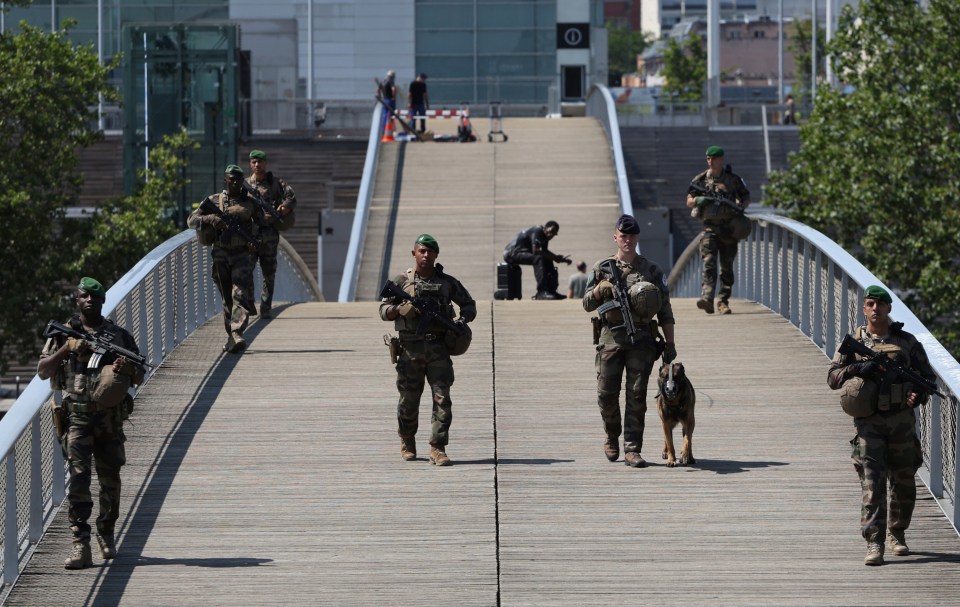 Soldiers patrolling the River Seine at the Olympics