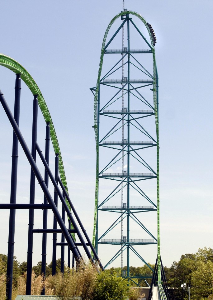 a roller coaster that is very tall and green