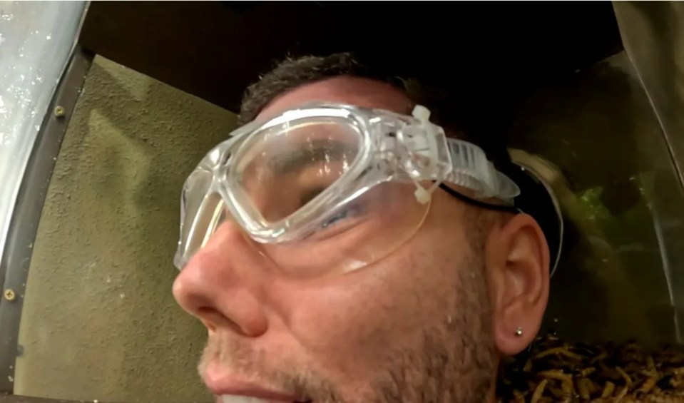 a man wearing a pair of clear safety goggles