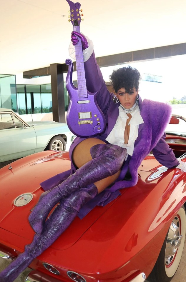 Bey looked every inch the rock princess as she posed with a purple guitar and lounged on the bonnet of a little red Corvette