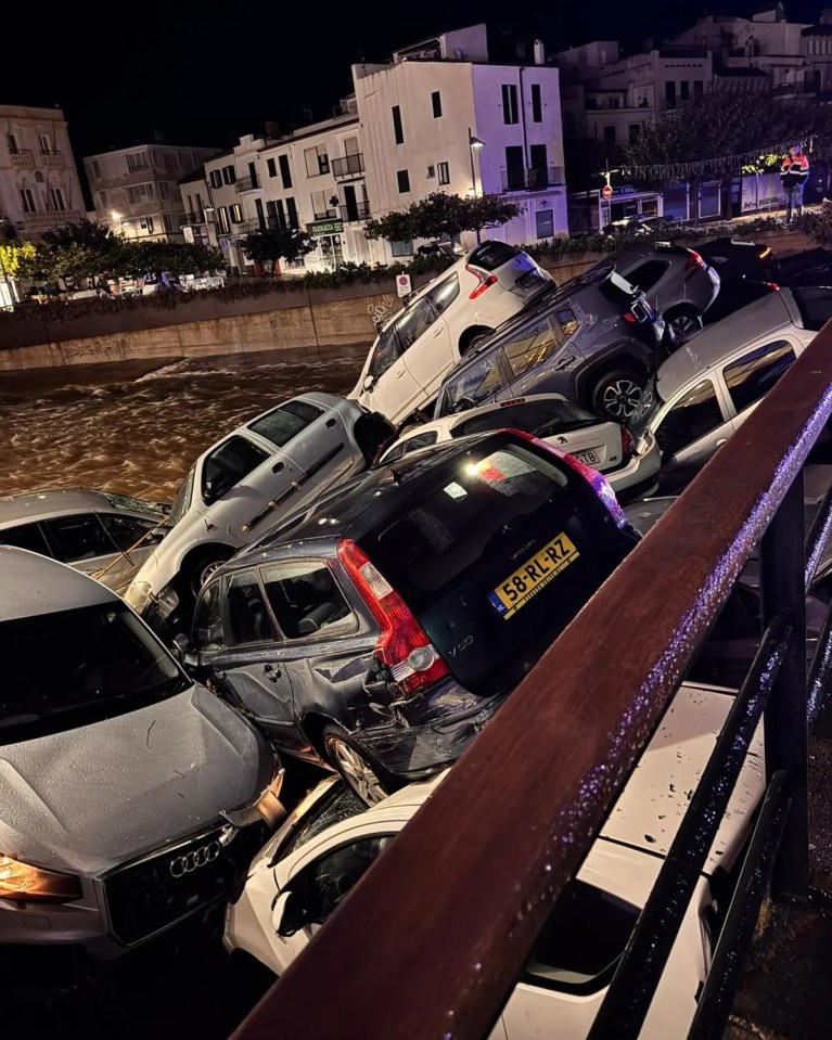 Destroyed cars were piled high in the Spanish town