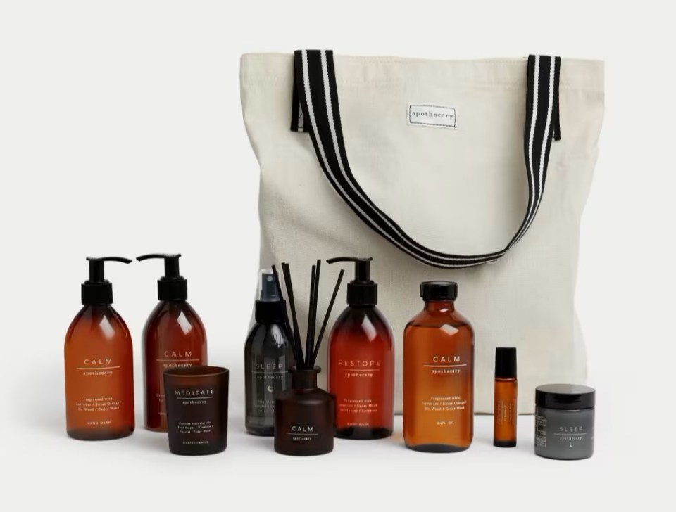 a tote bag filled with a variety of calm products