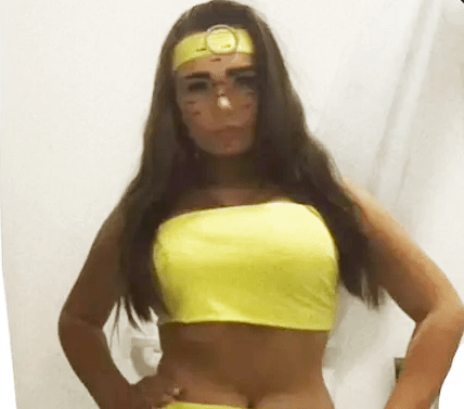 a woman is wearing a yellow crop top and a yellow headband