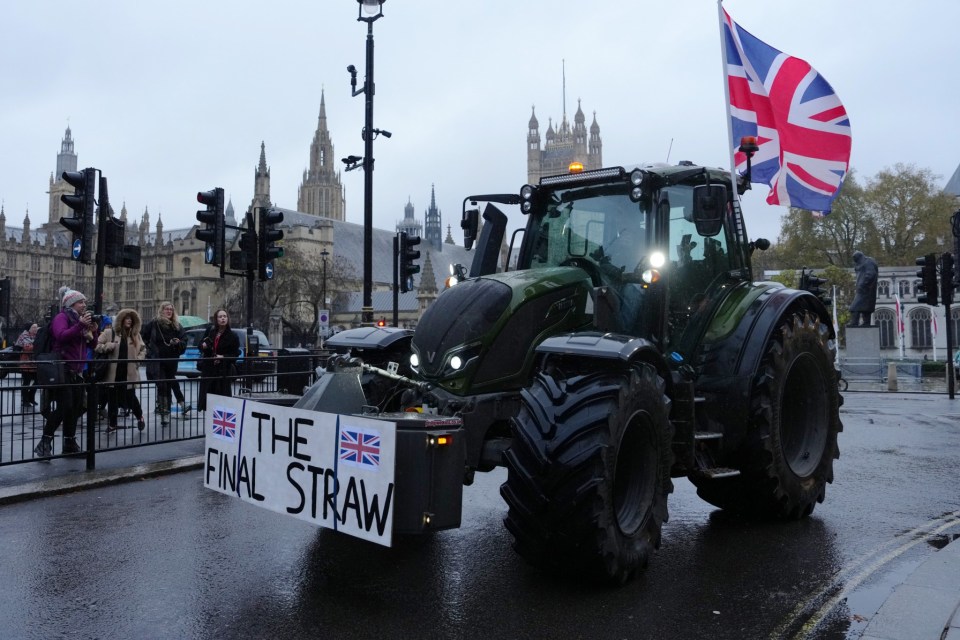 a tractor with a sign that says the final straw