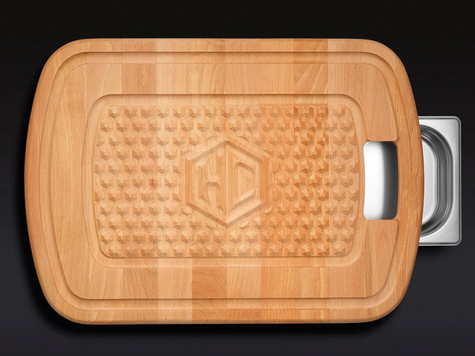 HexClad hybrid cutting board with integrated food container.