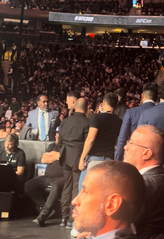 Tom Aspinall acknowledges Jon Jones' dad as he makes his way to his seat