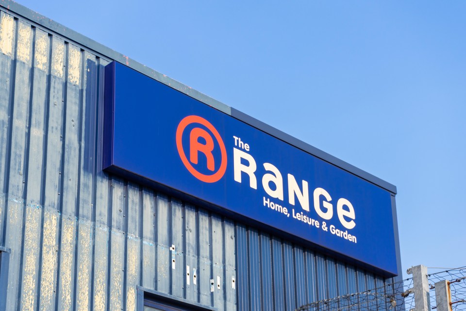 a blue sign for the range home leisure and garden