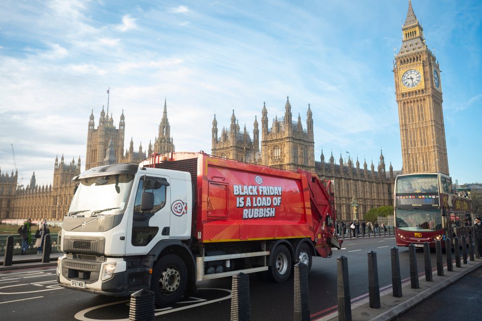 A red rubbish lorry stacked with discarded gadgets rolled through London yesterday, declaring 'Black Friday is a load of rubbish' as CeX called for better, more sustainable shopping.