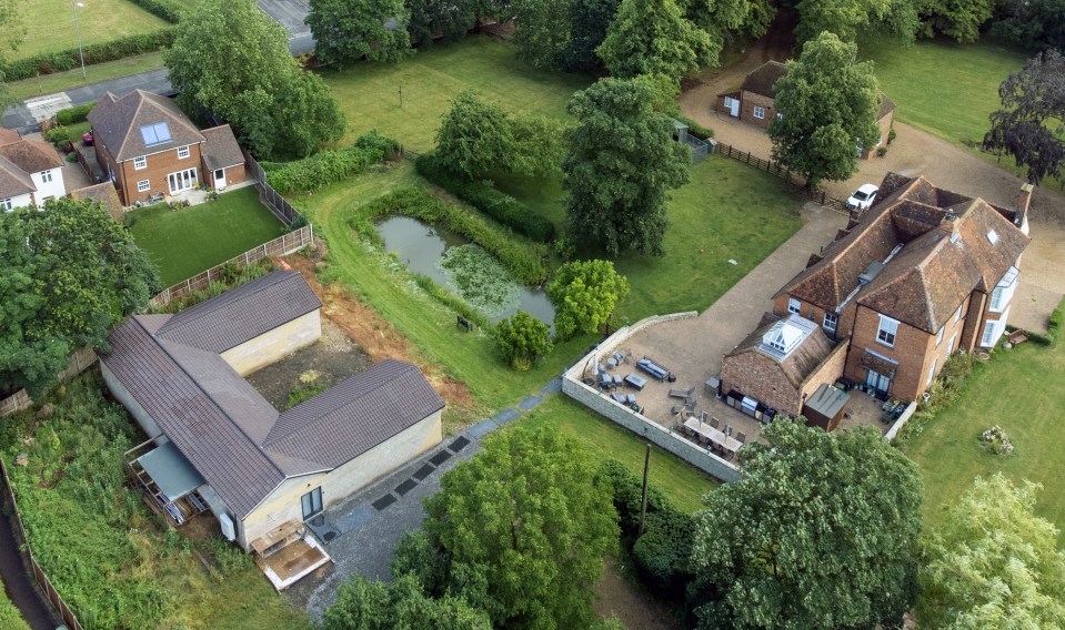 A view of the home of Hannah Ingram-Moore, the daughter of the late Captain Sir Tom Moore, at Marston Moretaine, Bedfordshire. The Captain Tom Foundation has stopped taking money from donors after planning chiefs ordered that an unauthorised building in the home of the daughter of the late charity fundraiser be demolished. Picture date: Wednesday July 5, 2023. PA Photo. Central Bedfordshire Council said a retrospective planning application had been refused and an enforcement notice issued requiring the demolition of the "now-unauthorised building" containing a spa pool. On Tuesday, the foundation put out a statement saying it would not seek donations, and was closing all payment channels, while the Charity Commission carried out an inquiry. See PA story SOCIAL CaptainTom. Photo credit should read: Joe Giddens/PA Wire