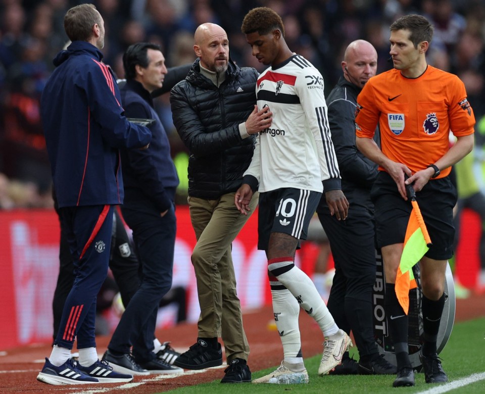 Manchester United's English striker #10 Marcus Rashford (3R) passes Manchester United's Dutch manager Erik ten Hag as he leaves the pitch after being substituted off during the English Premier League football match between Aston Villa and Manchester United at Villa Park in Birmingham, central England on October 6, 2024. (Photo by Adrian Dennis / AFP) / RESTRICTED TO EDITORIAL USE. No use with unauthorized audio, video, data, fixture lists, club/league logos or 'live' services. Online in-match use limited to 120 images. An additional 40 images may be used in extra time. No video emulation. Social media in-match use limited to 120 images. An additional 40 images may be used in extra time. No use in betting publications, games or single club/league/player publications. / (Photo by ADRIAN DENNIS/AFP via Getty Images)