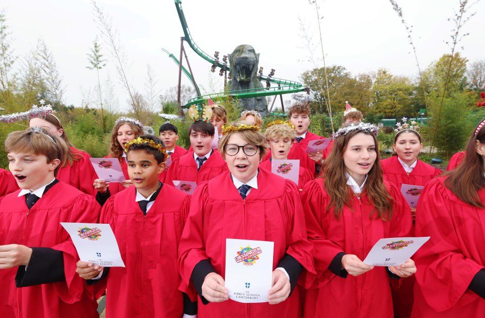 The Crypt Choir of The King’s School Canterbury rehearses for an extreme carol , 66ft up in the air on Chessington World of Adventures' Mandrill Mayhem rollercoaster