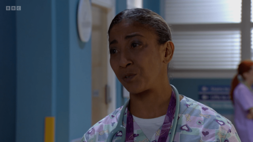 a nurse with a stethoscope around her neck is on bbc television